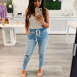 Distressed Pullover Jeans